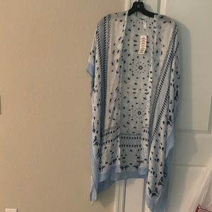 Blue cardigan with side slits… brand new.. one size fits all